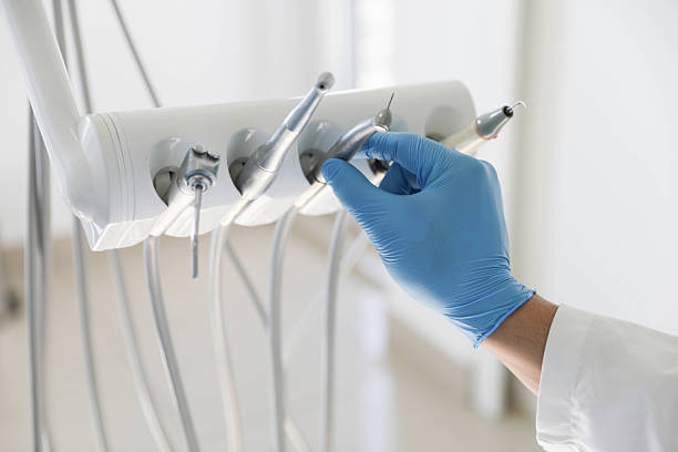 Professional Tooth Extraction technician working in Newington Forest, VA